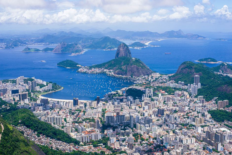 Stunning aerial view capturing Sugarloaf Mountain and Rio de Janeiro's vibrant cityscape.