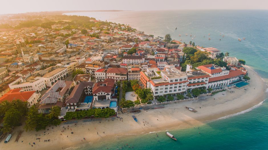 A breathtaking aerial shot of Stone Town, Zanzibar featuring historic architecture and scenic coastline.